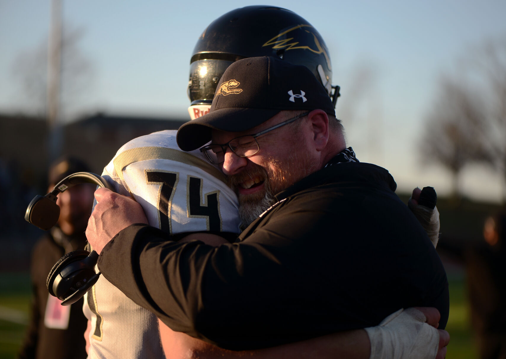 Marshall Mankini and Will McKnight embrace